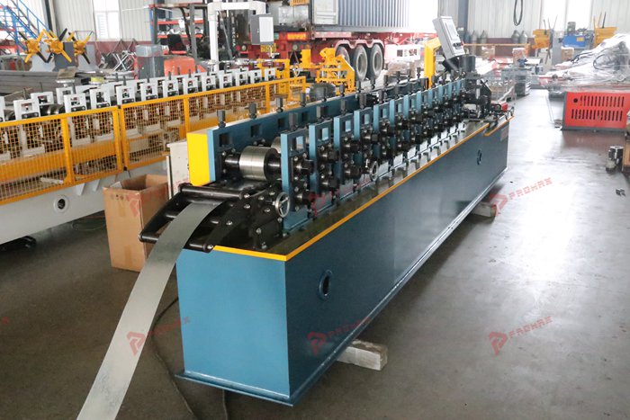 Metal stud roll former for continuous steel framing profile manufacturing