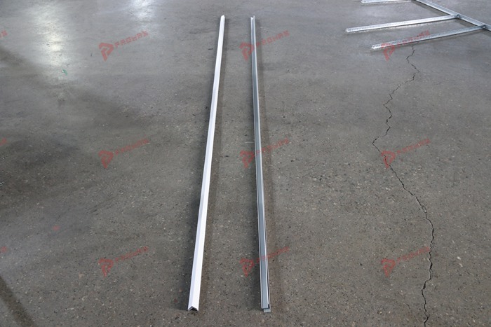 Metal wall angle profiles and roll forming machine for ceiling systems