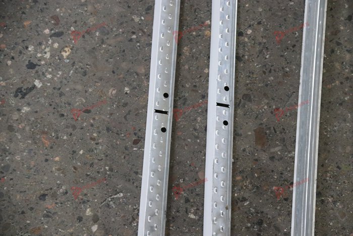 Metal cross tee production equipment for suspended ceiling grid systems