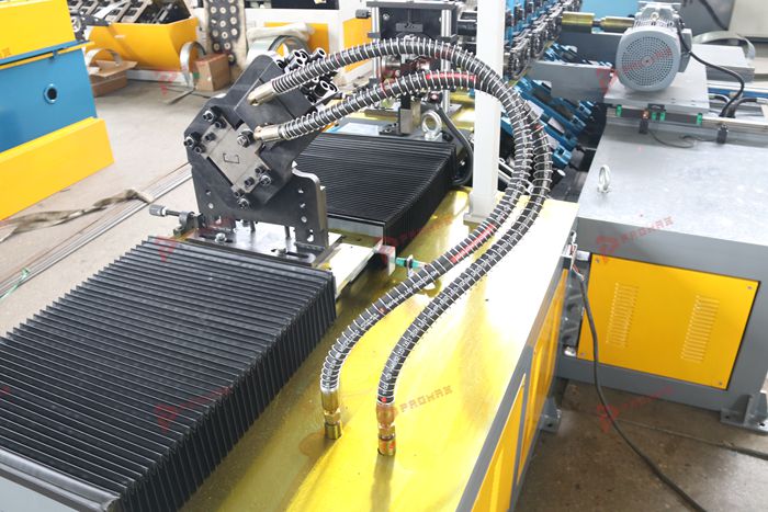 Light gauge steel framing machine with progressive roll forming stations