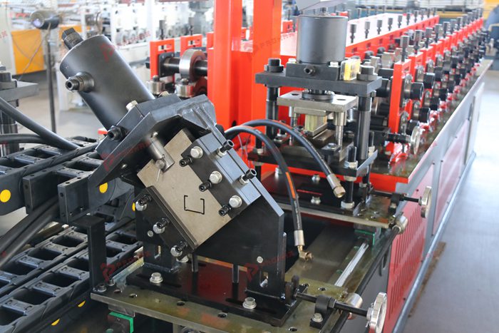 Dual-head light steel framing roll former configured for customized metal profiles